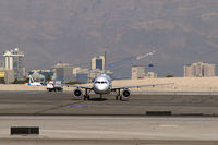 N926FR @ KLAS - Frontier Airlines - 'Domino - Black Tail Deer Fawn' / 2004 Airbus A319-111 - by Brad Campbell