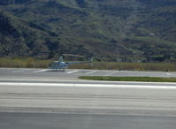 N688SS @ SZP - 2000 Robinson R44 RAVEN, Lycoming O-540 260 Hp derated to 225 Hp at takeoff, 205 Hp continuous, on SZP's Helipad - by Doug Robertson