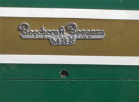 N9856R @ SZP - 1960 Beech M35 BONANZA, Continental IO-470-C 250 Hp, cowl logo - by Doug Robertson