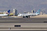 N950FR @ KLAS - Frontier Airlines - 'Bob - Bottlenose Dolphin' / 2007 Airbus A319-111 - by Brad Campbell