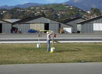 N3042M @ SZP - 1947 Piper PA-12 SUPER CRUISER, Lycoming O-360 180 Hp upgrade (field approval), erecting banner tow practice pickup tape - by Doug Robertson