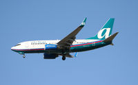 N318AT @ KATL - On final for Runway 26R - by Michael Martin