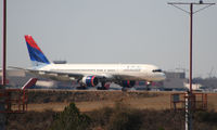 N660DL @ KATL - Number one for Runway 26L - by Michael Martin