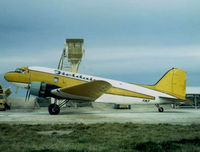ZK-AWP @ NZGS - Loading at Gisborne 1980 with Basil Martin - by Neville Worsley