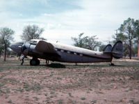 N21G @ KLHX - Taken May 1977 at LaJunta, Colorado. She'd rolled back into a large tank during a bout with high winds and crushed the tail cone. - by Gerry Asher