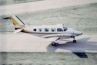 N27985 @ DPA - Photo taken for aircraft recognition training.  Piper Navajo taxiing past the control tower - by Glenn E. Chatfield