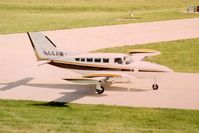 N44AW @ DPA - Photo taken for aircraft recognition training.  taxiing by the control tower - by Glenn E. Chatfield