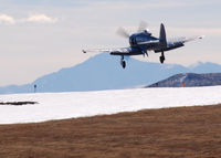 N254SF @ KAPA - Landing on 17L. Pikes Peak in the distance. - by Bluedharma