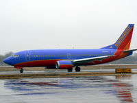 N616SW @ DAL - Southwest Airlines - In the rain at Love Field, Dallas, TX - by Zane Adams
