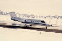 N744LC @ DPA - Photo taken for aircraft recognition training.  Learjet 25 taxiing past the control tower