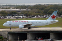 C-FLSU @ TPA - On the taxiway bridge