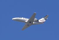 N28PT @ KSNA - Cessna 525 CitationJet climbing up - by Mike Khansa