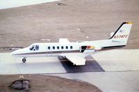 N374FC @ DPA - Photo taken for aircraft recognition training.  Cessna Citation 550 taxiing by the control tower