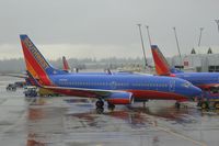 N410WN @ KSEA - Southwest Airlines 737 on another typical rainy day - by Michel Teiten ( www.mablehome.com )