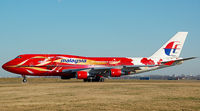 9M-MPB @ EHAM - red hibiscus - by Basti777
