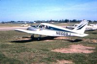 N6668J @ DSM - Departing Des Moines Flying Service tie downs - by Mark Martin
