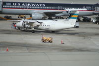 C6-BFP @ KFLL - DHC-8-300 - by Mark Pasqualino