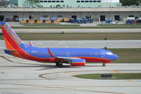 N246LV @ KFLL - Boeing 737-700 - by Mark Pasqualino