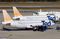 N497UA @ TPA - A pair of TED A320s on stand at Tampa - by Terry Fletcher