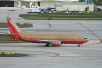 N335SW @ KFLL - Boeing 737-300 - by Mark Pasqualino