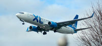 G-XLAN @ BFI - On final at BOEING Field - by Wolf Kotenberg