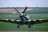 G-BLCK @ EGSU - Spitfire Mk.IX warming up at Duxford, UK. - by Henk van Capelle