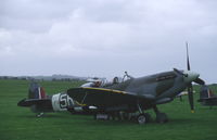G-TRIX @ EGSU - Spitfire Mk.IX trainer at Duxford, UK. Crashed 8 april 2000, but was rebuilt as G-CCCA. - by Henk van Capelle