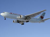 C-FBEG @ CYUL - On short final for runway 24R - by CdnAvSpotter