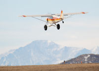 N4007Z @ KAPA - On final approach to 17L. Pikes Peak in the distance.