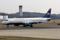 N946UW @ ORF - US Airways N946UW (FLT USA931) taxiing to RWY 23 via Taxiway Charlie for departure to Charlotte/Douglas Int'l (KCLT). - by Dean Heald