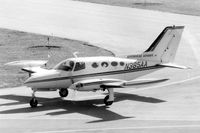 N385AA @ DPA - Photo taken for aircraft recognition training.   Cessna 401 Taxiing by the control tower - by Glenn E. Chatfield
