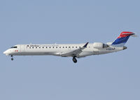 N748EV @ CYUL - On final for Rwy 24R - by CdnAvSpotter