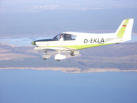 F-BUKH - D-EKLA (F-Bukh) overhead Mueritz/Germany - by W. Wille