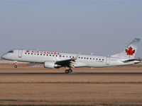 C-FGMF @ CYYC - Big Smoke show from a small plane as this AC E190 touches down on Rwy 34