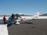 N5302X @ IPT - Doing what every good pilot does before flight - by Sam Andrews