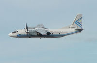 UK-26003 @ MIA - Although Ukraine registered this AN26 has been based in Florida for some time now - seen climbing out of Miami in Feb 2008 - by Terry Fletcher