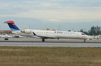 N369CA @ MIA - Comair / Delta Connection CRJ about to depart Miami