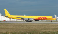 N804DH @ MIA - The yellow DHL livery makes this DC-8 appear incredibly long - by Terry Fletcher