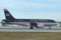 N738US @ MIA - US Airways A319 about to depart Miami - by Terry Fletcher