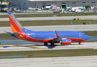 N717SA @ FLL - Southwest B737 taxies in at Ft.Lauderdale Int - by Terry Fletcher