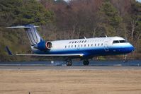 N593ML @ ORF - United Express (Operated by Mesa Airlines) N593ML from Washington Dulles Int'l (KIAD) as FLT ASH7241 with some America West painted cowl panels landing on RWY 23.
