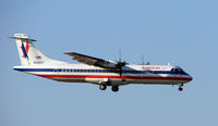 N342AT @ MIA - American Eagle ATR72 prepares for touchdown at Miami - by Terry Fletcher