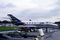 N909FR @ EGLF - N909FR at Farnborough surrounded by some garbage.
