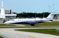 N437FX @ PBI - The business aircraft traffic at West Palm Beach on the Friday before President's Day always provides the aviation enthusiast / photographer with a treat - by Terry Fletcher