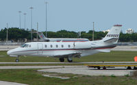 N690QS @ PBI - The business aircraft traffic at West Palm Beach on the Friday before President's Day always provides the aviation enthusiast / photographer with a treat - by Terry Fletcher