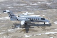 N168SL @ CID - Below the control tower - by Glenn E. Chatfield