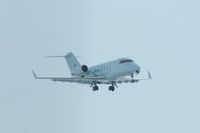 N88 @ CID - Low approach on Runway 31, Flight Check 88.  Gear coming up.