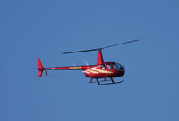 VH-MXR - Nice looking Robinson heading South over the Gold Coast