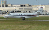 N610QS @ PBI - The business aircraft traffic at West Palm Beach on the Friday before President's Day always provides the aviation enthusiast / photographer with a treat - by Terry Fletcher