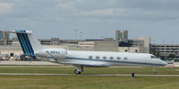 N914J @ PBI - The business aircraft traffic at West Palm Beach on the Friday before President's Day always provides the aviation enthusiast / photographer with a treat - by Terry Fletcher